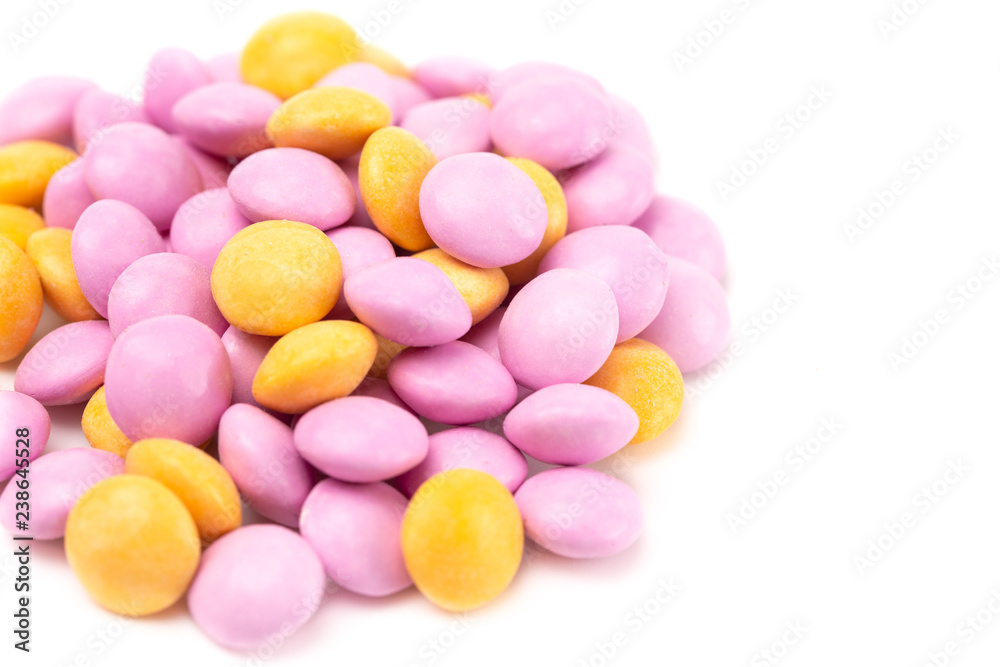 Pile of Candy Coated Chocolate Gems on a White Background Pile of Candy Coated Chocolate Gems on a White Background