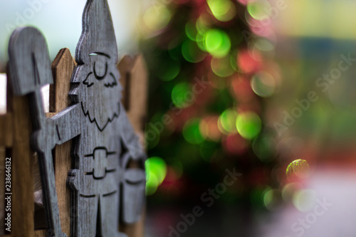 Decoration Santa or nomo and Christmas tree, in a leisure park. Winter holiday seasonal greeting card. photo