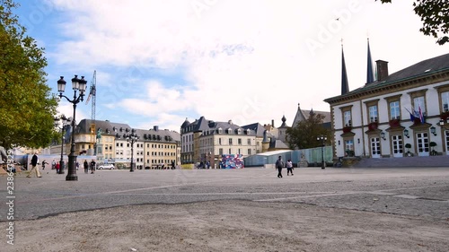 Square, Luxembourg-ville, Luxembourg, Europe. View of the square next to the town hall, in the city centre. People are walking. photo