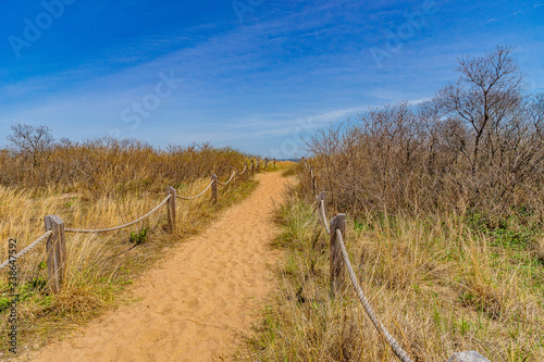 Passe through sand dunes  Staten Island NY US.
