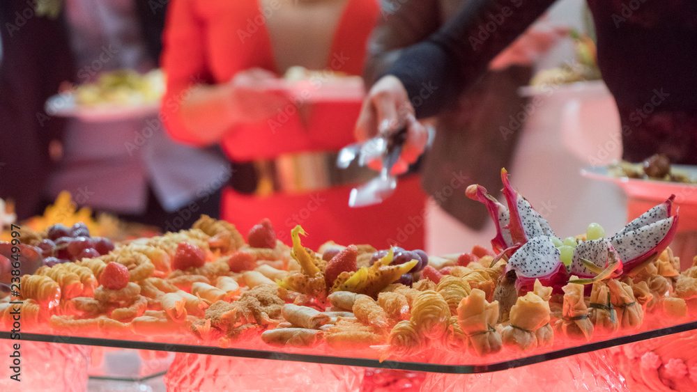 people group catering buffet food indoor in luxury restaurant with meat. people group catering buffet food indoor in luxury restaurant with meat.
