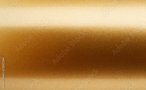 Extreme macro gold metal texture background with oblique line of light