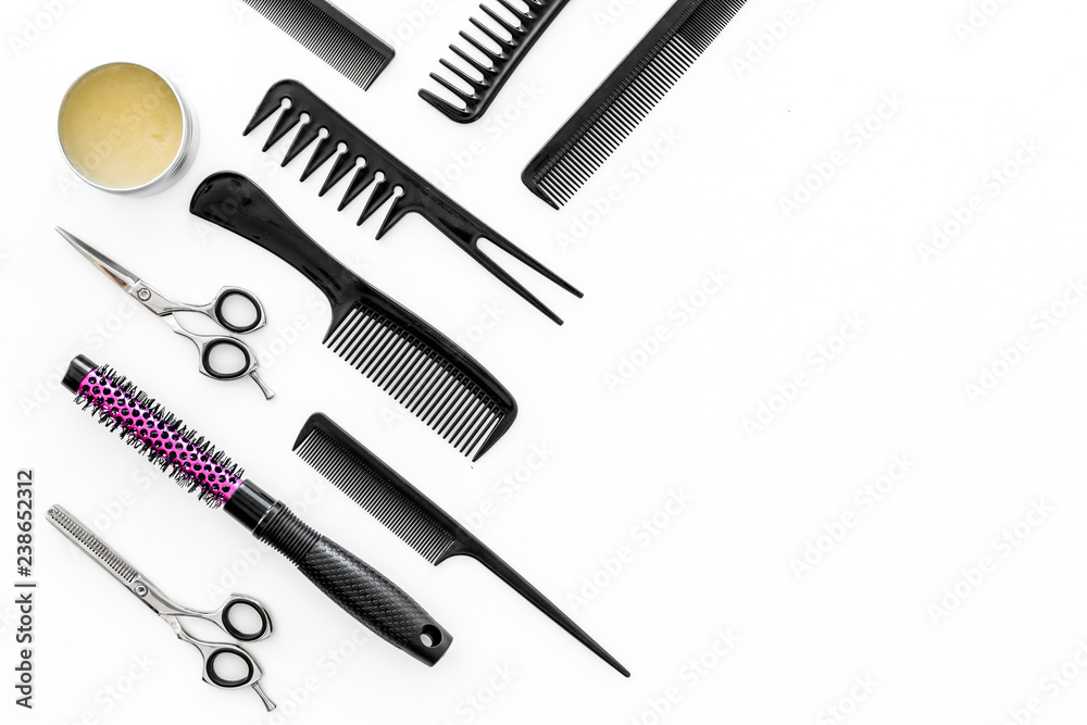Set of professional hairdresser tools with combs white background top view mock up