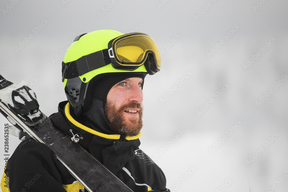 Portrait of a happy male skier