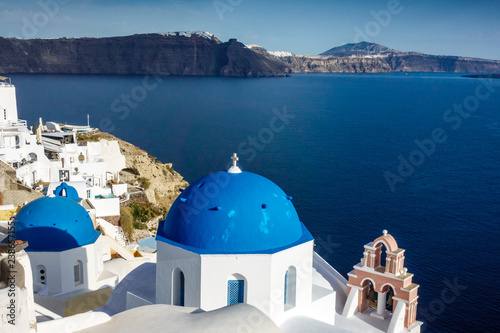 Fototapeta Naklejka Na Ścianę i Meble -  View of Church with seascape and mountain; Santorini island; Greece