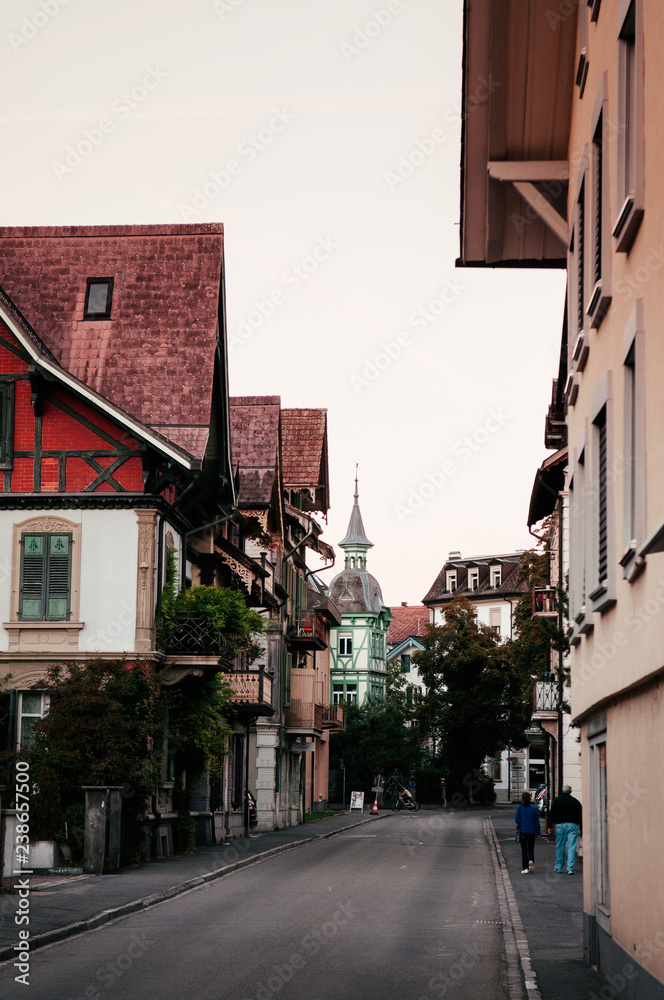 Evening street scene and old buildings in old town Interlaken, Switzerland