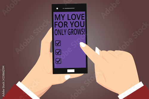 Conceptual hand writing showing My Love For You Only Grows. Business photo showcasing Expressing roanalysistic feelings good emotions Hu analysis Hands Holding Pointing Smartphone Color Screen