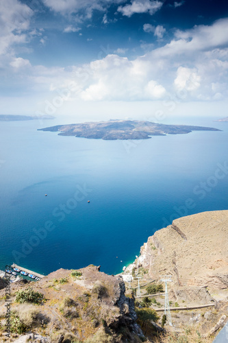 Rocky cliff and seascape; Oia; Santorini island; Greece