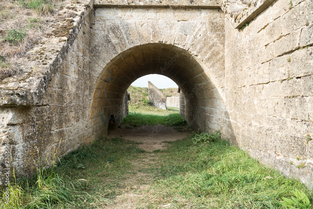 a pedestrian tunnel under an old fortress