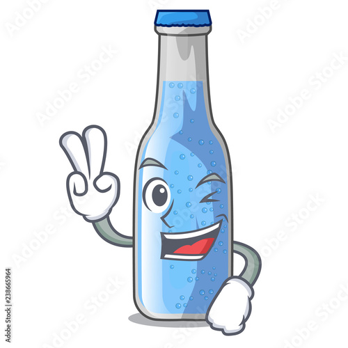 Two finger soda water bottle near cartoon table