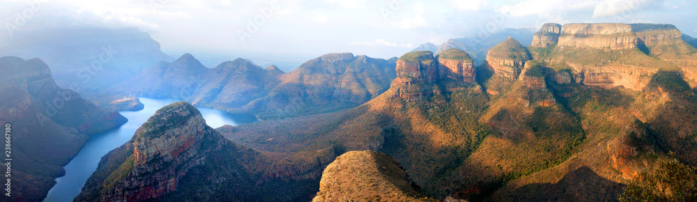Blyde River Canyon blue lake, Three Rondavels and God's Window, Drakensberg Mountains national park panorana on beautiful sunset light background, top view, South Africa, Mpumalanga Province