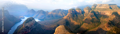Blyde River Canyon blue lake, Three Rondavels and God's Window, Drakensberg Mountains national park panorana on beautiful sunset light background, top view, South Africa, Mpumalanga Province