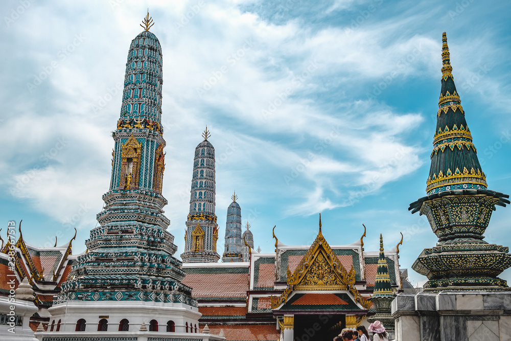 Fototapeta premium Tourists from around the world are visiting Wat Phra Kaew in the Royal Palace of Thailand. Located in Bangkok, the nation's capital, on October 23, 2018.