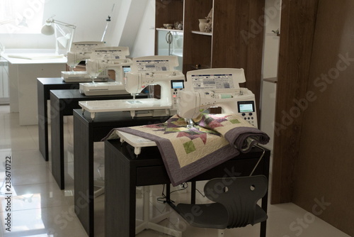 Modern electronic sewing machines, sewing courses in the office, sewing on the machine