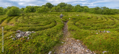 Stone labyrinths on the Bolshoy Zayatsky Island. Solovetsky archipelago, White Sea, Russia photo