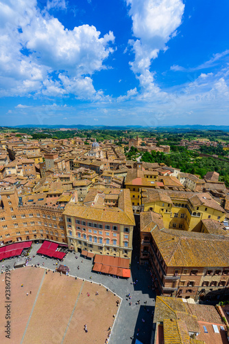 Piazza del Campo, Siena - Aerial view of the historic town with beautiful landscape scenery on a sunny summer day in Tuscany, walled medieval hill town with towers in the province of Siena, Italy
