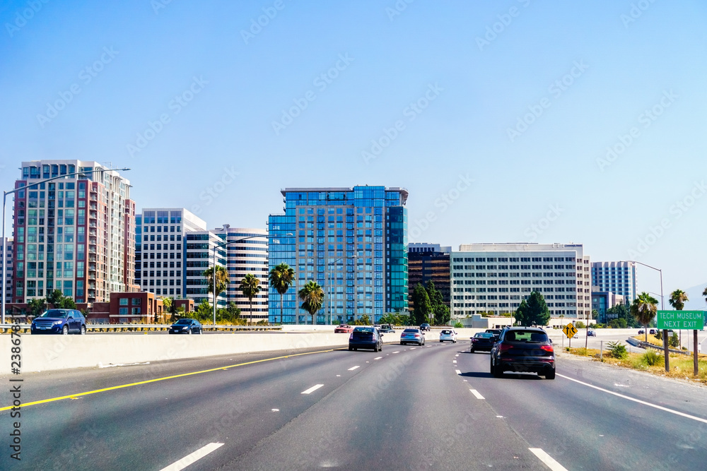San Jose skyline as seen from the nearby freeway, Silicon Valley, California - obrazy, fototapety, plakaty 
