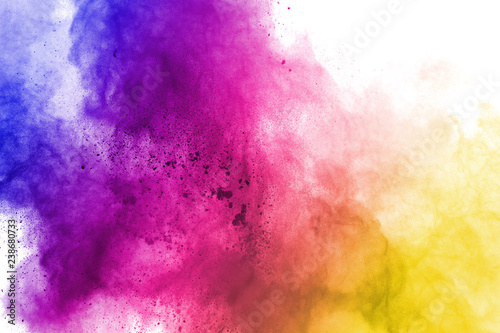 abstract powder splatted background. Colorful powder explosion on white background. Colored cloud. Colorful dust explode. Paint Holi.
