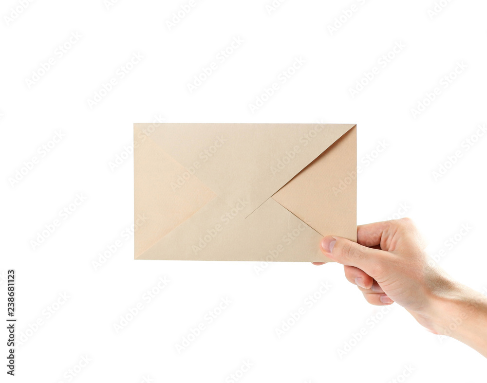 The hand holding the envelope. Close up. Isolated on white background