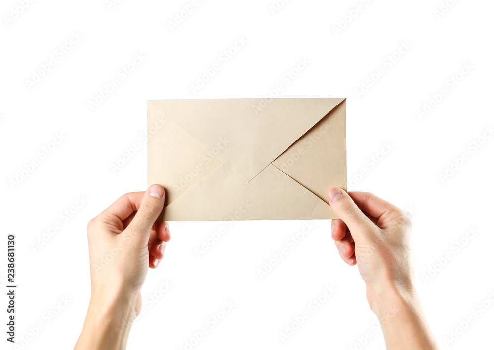 The hand holding the envelope. Close up. Isolated on white background
