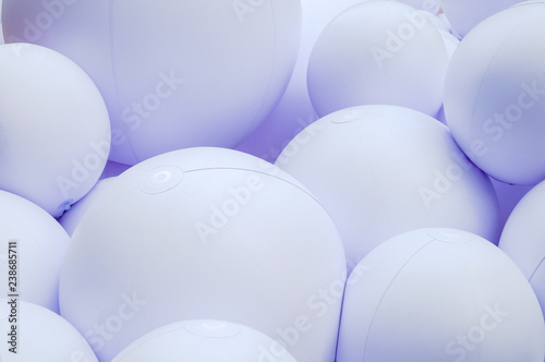 white balloons, white inflatable balls, plastic ball, background of white and gray circles, festive background of balloons monochrom, white texture.