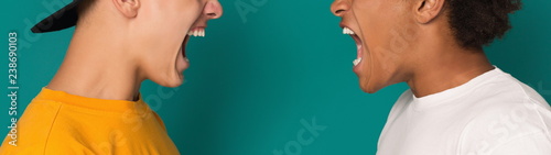 Quadro em tela Two teens having conflict and shouting at each other