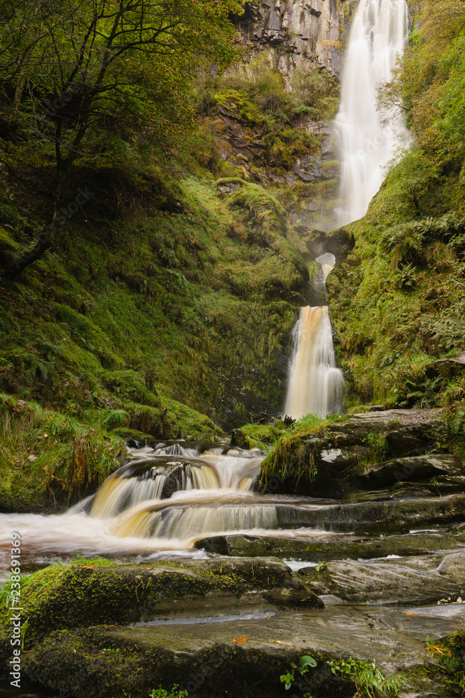 Obraz premium Pistyll Rhaeadr waterfall in Llanrhaeadr ym Mochnant Powys where the river Afon Disgynfa drops 240 feet also listed as one of the Seven Wonders of Wales