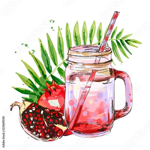 Smoothie jar with pomegranate and tropical leaf.