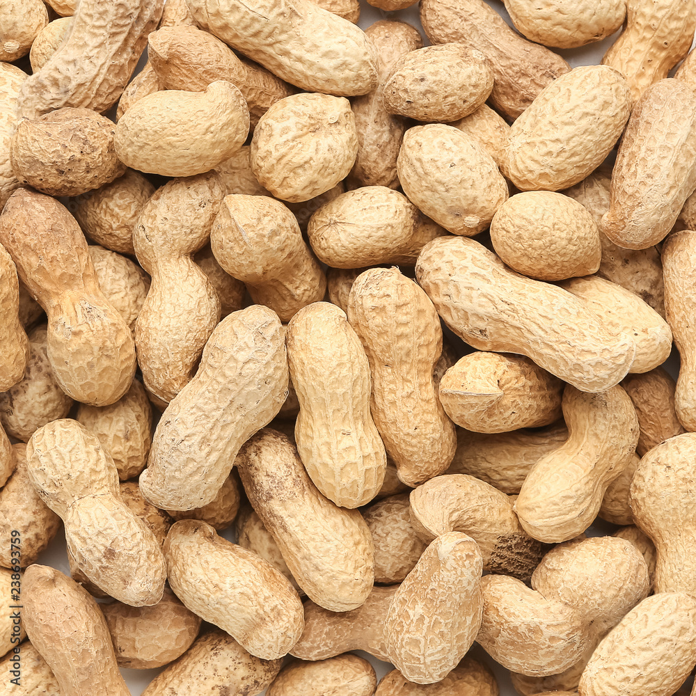 Peanuts in shell texture background, on display at farmer's market Peanuts in shell texture background, on display at farmer's market