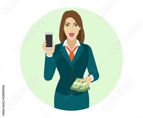 Businesswoman holding a mobile phone and money
