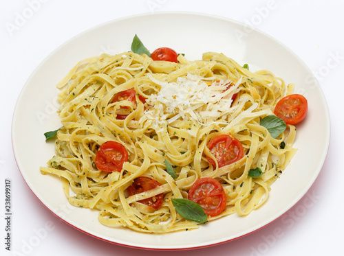 Tagliatelle with pesto and tomatoes