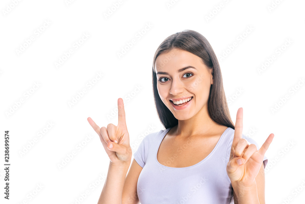 portrait of smiling attractive woman showing rock sign isolated on white portrait of smiling attractive woman showing rock sign isolated on white