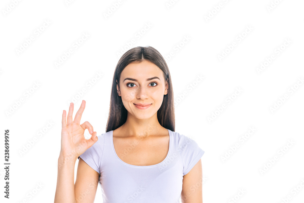 portrait of beautiful woman showing ok sign isolated on white portrait of beautiful woman showing ok sign isolated on white