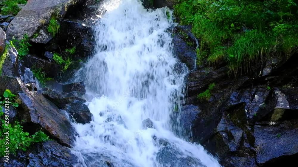 Mountain waterfall at summer green forest. Summer nature video Mountain waterfall at summer green forest. Summer nature video