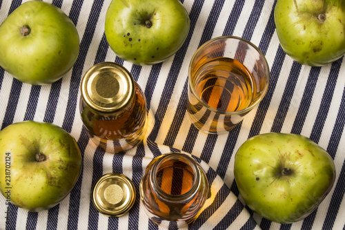 homemade apple juice from an old british apple variety, bramley photo