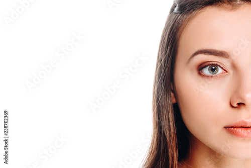 partial view of woman looking away isolated on white