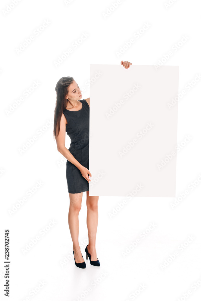 woman in black dress looking at blank banner in hands isolated on white woman in black dress looking at blank banner in hands isolated on white