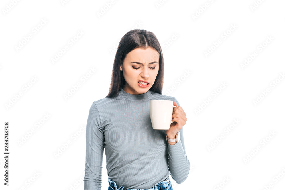 portrait of emotional young woman with cup of coffee isolated on white portrait of emotional young woman with cup of coffee isolated on white