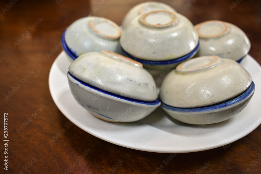 Porcelain Cup of Khanom Thuai or Thai Coconut Custard, Thai Dessert.