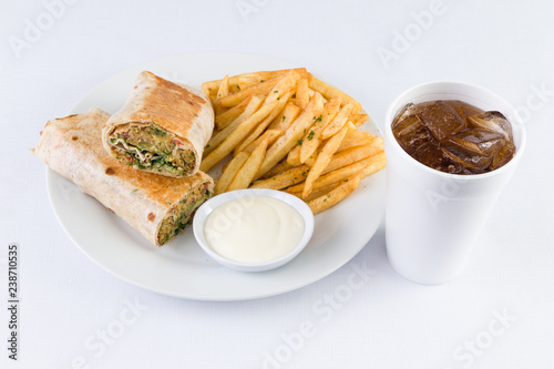 Falafel Pita Sandwich Gyro with fries and soda in Mediterranean Levantine  Cuisine