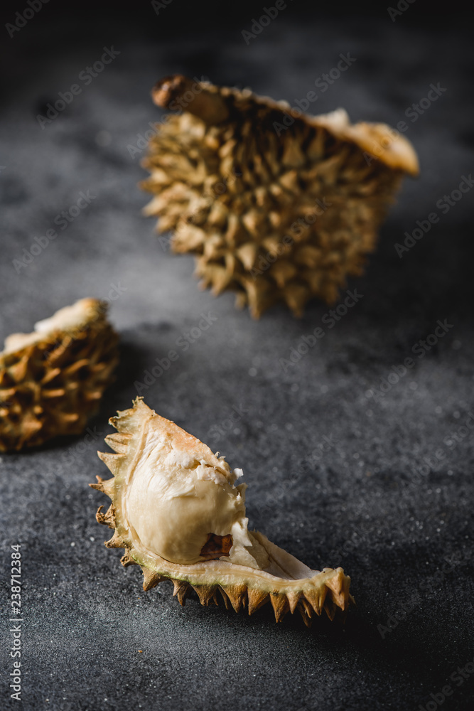 Naklejka premium Durian exotic fruit from Asia on concrete table