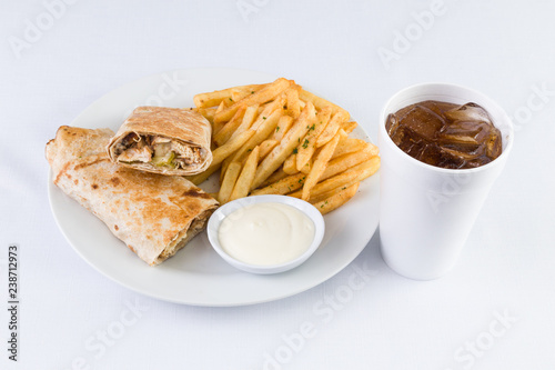 Chicken Kabab Pita Sandwich with fries and soda in Mediterranean Levantine  Cuisine