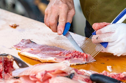 Cutting fish for cooking 