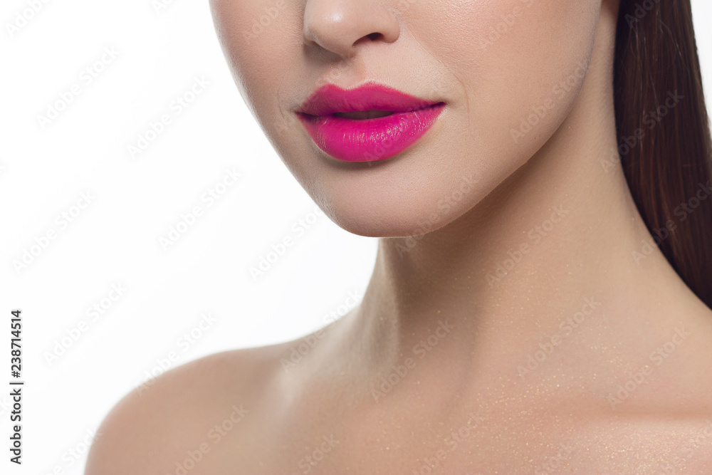 Closeup of beautiful female mouth with pink lip makeup. Closeup of beautiful female mouth with pink lip makeup.