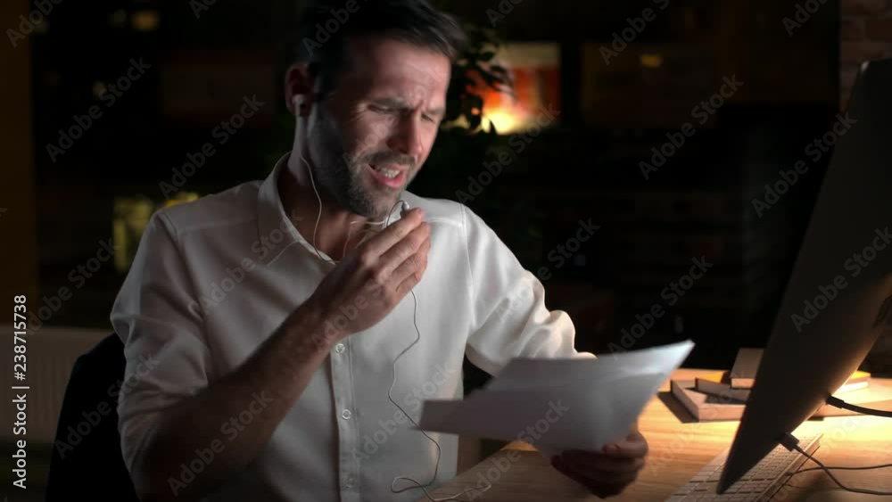 Angry businessman talking by mobile phone Angry businessman talking by mobile phone