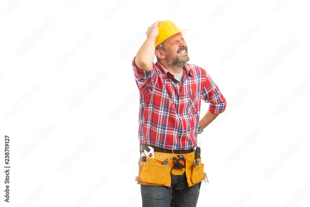 Foreman touching helmet as problem concept. Foreman touching helmet as problem concept.