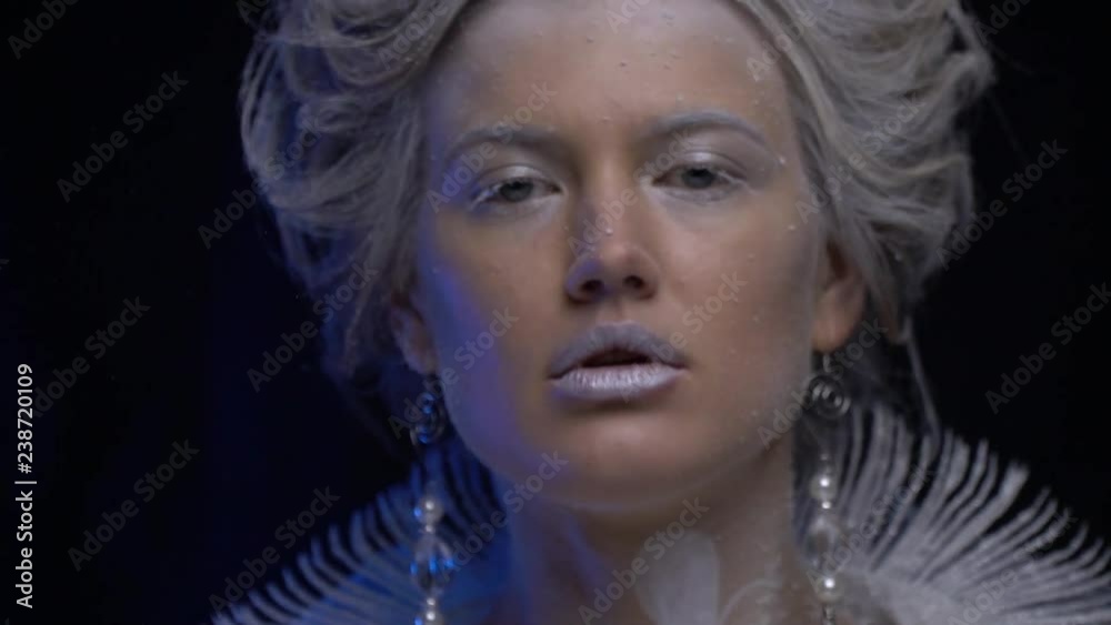 The beautiful snow queen lifts up her head The beautiful snow queen lifts up her head