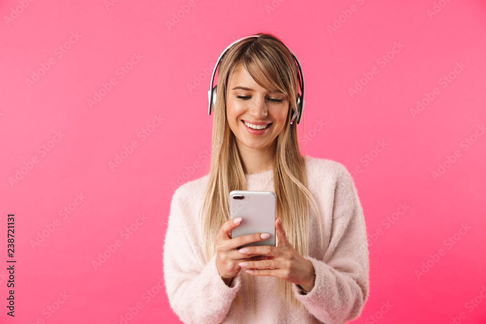 Cheerful young blonde woman wearing sweater Cheerful young blonde woman wearing sweater
