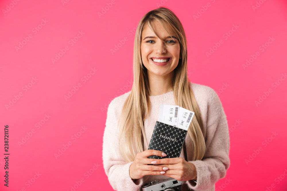 Cheerful young blonde woman wearing sweater Cheerful young blonde woman wearing sweater