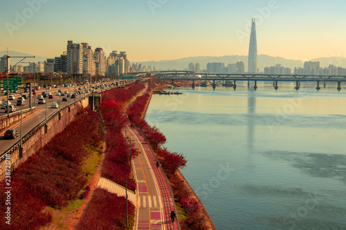 Photography Seoul city at han river with lotte world tower background.